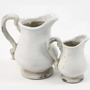 Antiqued White Ornate Stoneware Pitcher